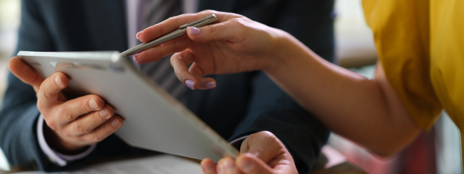 User interacting with a managed iPad configured with Microsoft Intune for secure kiosk or business use