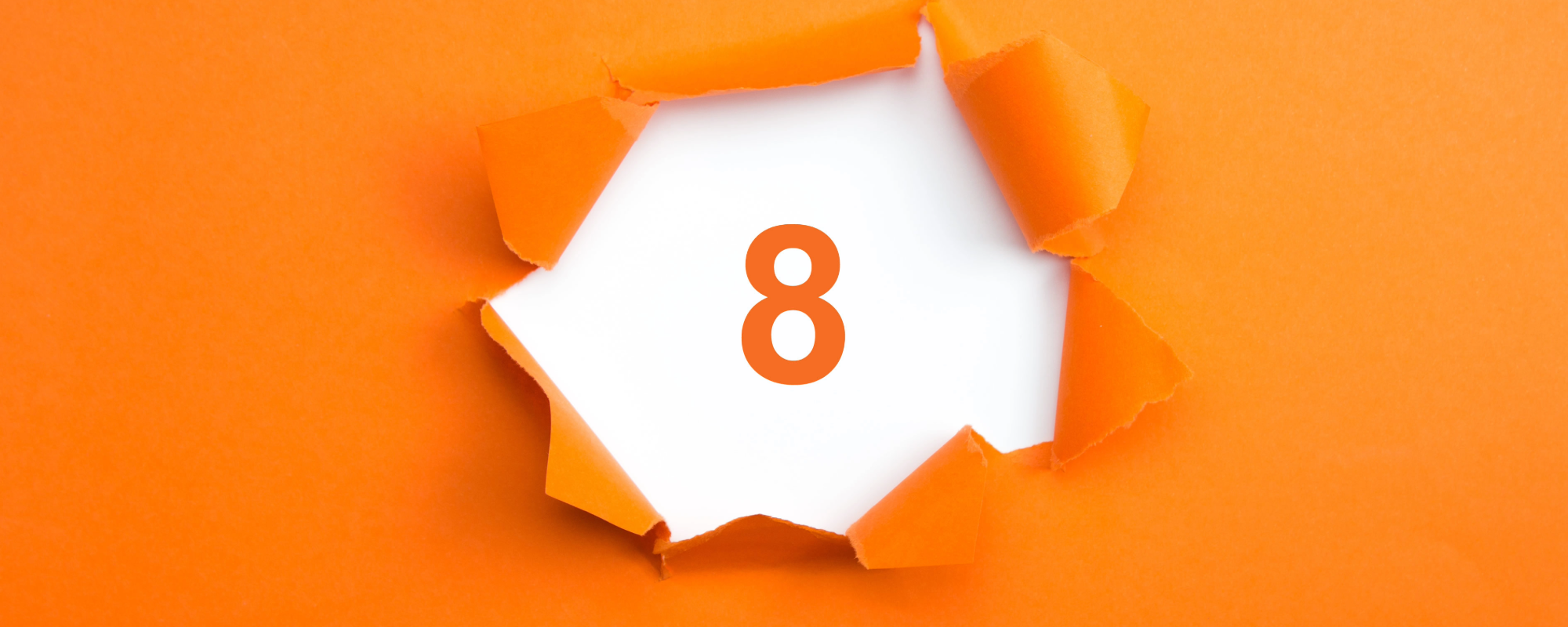 Essential Eight cyber security framework shown as number 8 through torn orange paper